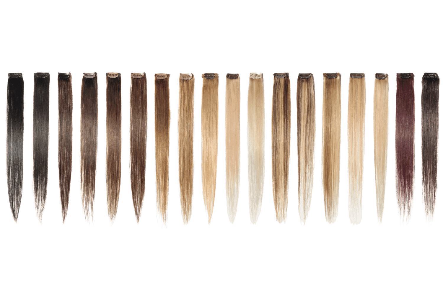 Various shades of hair extensions arranged in a gradient from dark brown to light blonde.